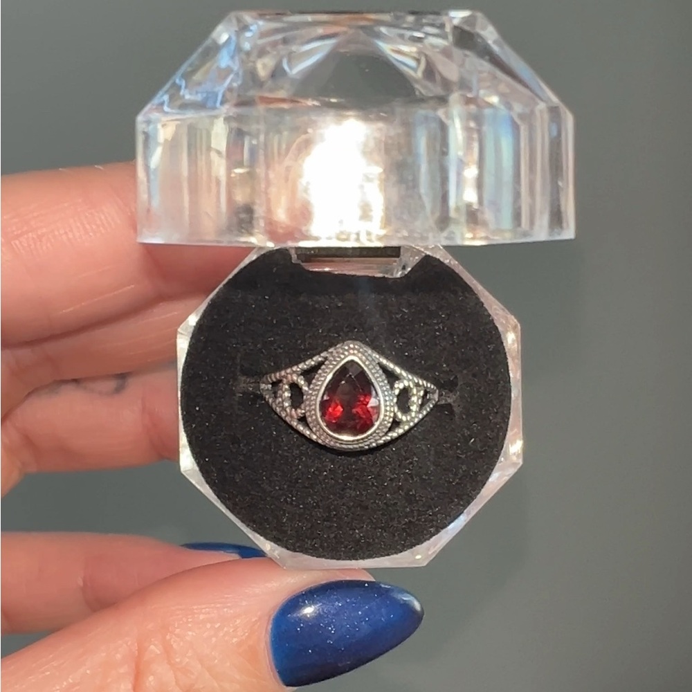 Elegant Silver and Garnet Gemstone Ring